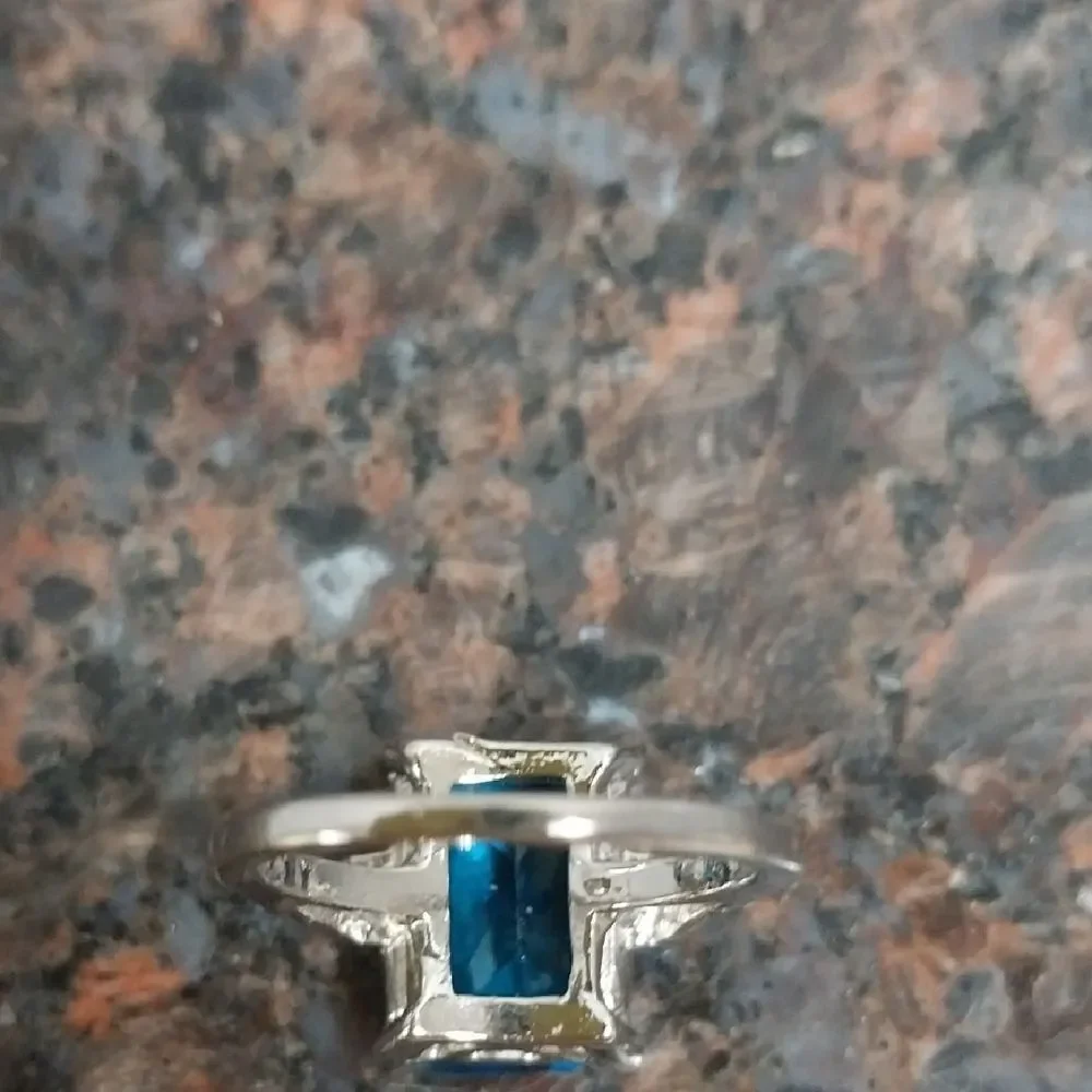 Unlisted Silver Ring with Vibrant Blue Gem..it Is In perfect Condition b
